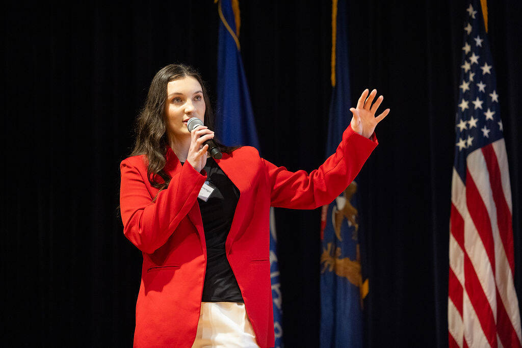 Student presenting at 3-Minute Thesis Competition